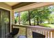 Serene balcony view with comfortable seating overlooking the community green space at 234 Westleton Dr. # 21-C, Myrtle Beach, SC 29572
