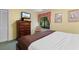 Cozy bedroom features a TV, dresser, and a scenic view from the window at 234 Westleton Dr. # 21-C, Myrtle Beach, SC 29572