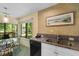 Dining area with natural light and views of the green outdoor space at 234 Westleton Dr. # 21-C, Myrtle Beach, SC 29572