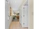 Hallway with tile flooring leading into a brightly lit living space at 234 Westleton Dr. # 21-C, Myrtle Beach, SC 29572