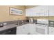 Kitchen featuring white cabinets, granite countertops, and modern appliances at 234 Westleton Dr. # 21-C, Myrtle Beach, SC 29572