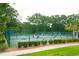 Active tennis courts surrounded by lush greenery, creating a vibrant and recreational atmosphere at 234 Westleton Dr. # 21-C, Myrtle Beach, SC 29572