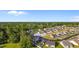 Wide aerial view of 263 Lakota Loop highlighting its location, neighborhood density, and proximity to wooded areas at 263 Lakota Loop, Longs, SC 29568