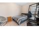 Cozy bedroom with carpet, featuring a twin bed, gaming desk and chair, and wooden dresser at 263 Lakota Loop, Longs, SC 29568