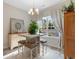 Bright dining area featuring a pendant light and view of the backyard at 263 Lakota Loop, Longs, SC 29568