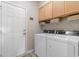 Well-organized laundry room with modern washer and dryer units at 263 Lakota Loop, Longs, SC 29568