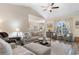 Cozy living room with stylish decor, vaulted ceilings and views to the dining area at 263 Lakota Loop, Longs, SC 29568