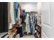 Walk-in closet is packed full of clothes and accessories with shelving and storage at 263 Lakota Loop, Longs, SC 29568