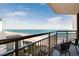 Ocean view from balcony with chairs and a drink at 2710 N Ocean Blvd. # 804, Myrtle Beach, SC 29577