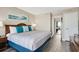 Cozy bedroom with a painting, stylish furnishings, and a balcony view at 2710 N Ocean Blvd. # 804, Myrtle Beach, SC 29577