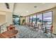 Cozy seating area with beach views through large picture windows at 2710 N Ocean Blvd. # 804, Myrtle Beach, SC 29577