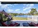 A lovely back patio with great lake views and a barbecue grill for entertaining and relaxation at 2940 Tigers Eye Rd., Little River, SC 29566