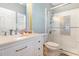 Clean bathroom featuring a glass-enclosed shower, a white vanity, and modern fixtures at 311 2Nd Ave. N # 210, North Myrtle Beach, SC 29582
