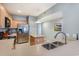 Well-lit kitchen featuring stainless steel appliances, light wood cabinets, and a functional island at 311 2Nd Ave. N # 210, North Myrtle Beach, SC 29582