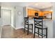 Kitchen with seating, wooden cabinets and stainless steel appliances at 311 2Nd Ave. N # 210, North Myrtle Beach, SC 29582