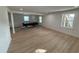 Large basement with a pool table, light wood flooring, and lots of natural light at 326 15Th Ave. S, Surfside Beach, SC 29575