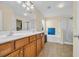 This luxurious bathroom features a double vanity, soaking tub, and separate shower at 381 Winslow Ave., Myrtle Beach, SC 29588