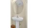 This bathroom features a pedestal sink and stylish mirror at 381 Winslow Ave., Myrtle Beach, SC 29588