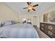 This bedroom features natural light, carpet, ceiling fan, and closet at 381 Winslow Ave., Myrtle Beach, SC 29588