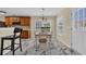 This bright breakfast nook features stylish floors, natural light, and updated light fixtures at 381 Winslow Ave., Myrtle Beach, SC 29588