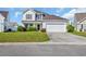 Charming two-story home with a well-manicured lawn and a two-car garage at 381 Winslow Ave., Myrtle Beach, SC 29588