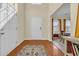 Open foyer with a beautiful white door and wood flooring at 381 Winslow Ave., Myrtle Beach, SC 29588