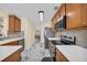 Modern kitchen with stainless steel appliances and white countertops at 381 Winslow Ave., Myrtle Beach, SC 29588