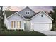 Charming single-story home with a symmetrical facade, attached garage, and well-manicured lawn at 4008 Braid Ct., Myrtle Beach, SC 29588