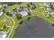 Aerial view of community amenities: playground, pool, basketball court, and pond at 4008 Scarlet Oak Ct., Myrtle Beach, SC 29579