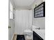 Functional bathroom with toilet, vanity, shower with curtain, and modern finishes at 4008 Scarlet Oak Ct., Myrtle Beach, SC 29579
