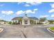 Charming community clubhouse featuring neutral colors, tidy landscaping, and a welcoming entrance at 4008 Scarlet Oak Ct., Myrtle Beach, SC 29579