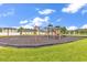 Community playground with swings, slides, and climbing structures on a safety-conscious mulch surface at 4008 Scarlet Oak Ct., Myrtle Beach, SC 29579