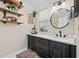 Bathroom vanity with dark wood cabinets and ornate bronze hardware at 4023 Murrells Inlet Rd., Murrells Inlet, SC 29576