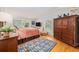 Charming bedroom featuring hardwood floors and large windows for natural light at 4023 Murrells Inlet Rd., Murrells Inlet, SC 29576