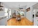 Inviting dining area with natural light, modern decor, and a seamless transition to outdoor spaces at 4023 Murrells Inlet Rd., Murrells Inlet, SC 29576