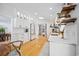 Bright kitchen features white cabinets, modern appliances, and a convenient breakfast bar at 4023 Murrells Inlet Rd., Murrells Inlet, SC 29576