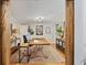 Well-designed home office with a rustic desk, stylish décor, and ample space for productivity and creativity at 4023 Murrells Inlet Rd., Murrells Inlet, SC 29576