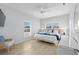 Bright bedroom with a king bed, large windows, and ample natural light at 4206 S Ocean Blvd., North Myrtle Beach, SC 29582