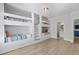 Bedroom featuring built-in bunk beds, natural light and adjacent bathroom at 4206 S Ocean Blvd., North Myrtle Beach, SC 29582
