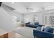 Cozy living room features modern furniture, plush area rug, and ample natural light at 4206 S Ocean Blvd., North Myrtle Beach, SC 29582