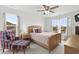 Bedroom featuring carpet, natural light, and a bed with a decorative chair at 4246 Livorn Loop, Myrtle Beach, SC 29579