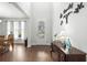Welcoming foyer with gleaming hardwood floors, designer accents, and plenty of natural light at 4246 Livorn Loop, Myrtle Beach, SC 29579