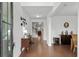 Bright foyer with hardwood floors, elegant decor, and a view of the staircase leading upstairs at 4246 Livorn Loop, Myrtle Beach, SC 29579
