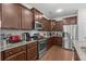 Modern kitchen features granite countertops, stainless steel appliances, and ample cabinet space at 4246 Livorn Loop, Myrtle Beach, SC 29579