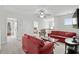 Bright living room featuring neutral walls, carpet, and a fan at 4246 Livorn Loop, Myrtle Beach, SC 29579