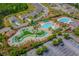 Stunning aerial view of the community pool, lazy river, and ample seating areas at 4246 Livorn Loop, Myrtle Beach, SC 29579