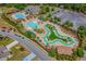 Magnificent aerial view showcasing the community pool, lazy river, and surrounding amenities at 4246 Livorn Loop, Myrtle Beach, SC 29579