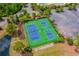 Aerial view of community tennis courts and surrounding landscape, offering a great recreational amenity at 4246 Livorn Loop, Myrtle Beach, SC 29579