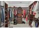 Large walk-in closet with built-in shelving and hanging rods for ample storage at 4246 Livorn Loop, Myrtle Beach, SC 29579
