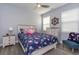 Comfortable bedroom with ceiling fan, decorative pillows, and lots of natural light at 428 Calhoun Falls Dr., Myrtle Beach, SC 29579